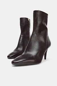 BOTTINES À TALONS EN CUIR