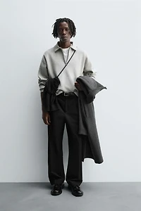 POLO EN MAILLE À COL ZIPPÉ