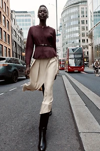 VESTE PEPLUM EFFET DAIM CEINTURÉE