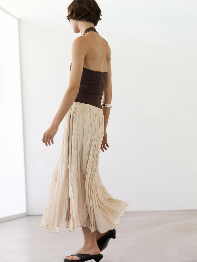 Flowing midi skirt with pleated detail