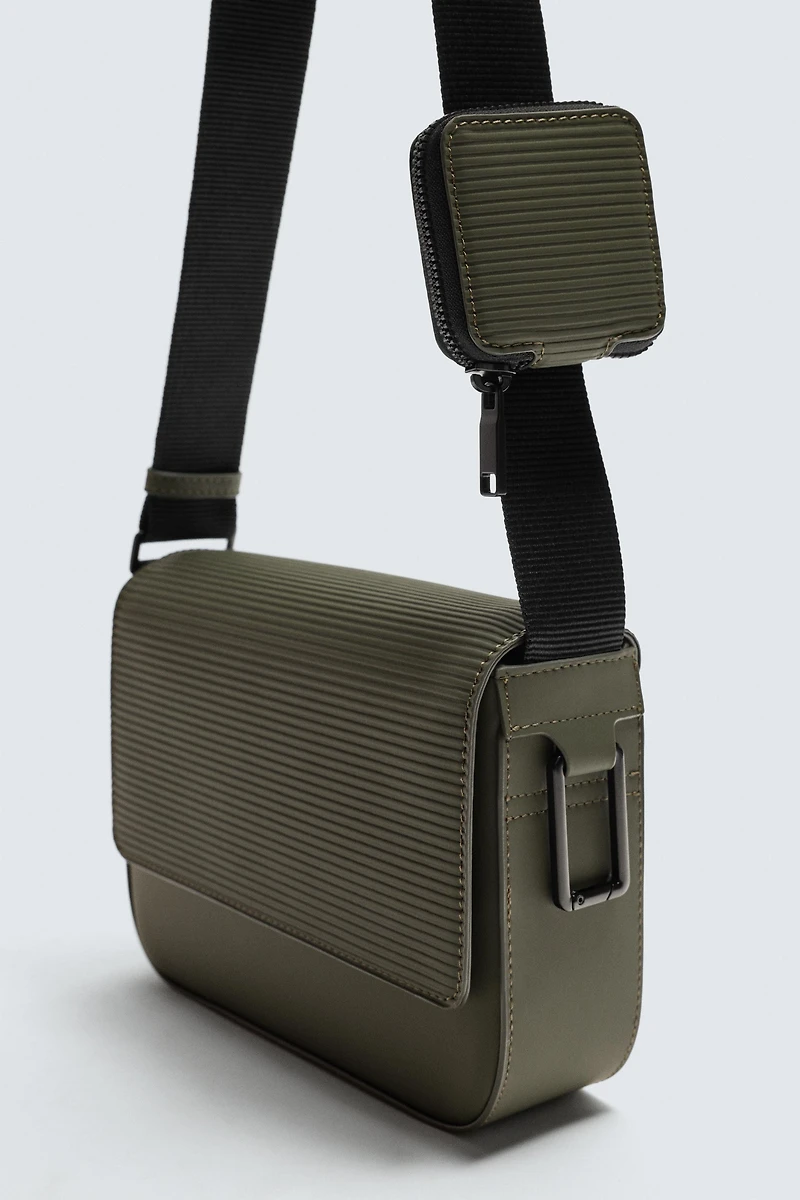 TEXTURED RUBBERIZED CROSSBODY BAG