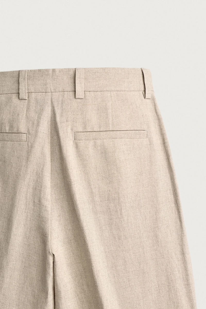 RELAXED FIT PLEATED SUIT PANTS