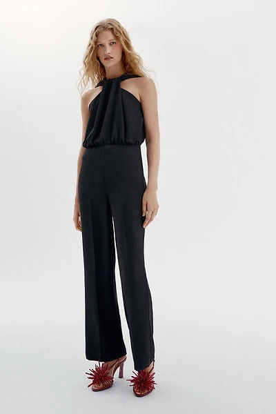 TWISTED NECK FLARE JUMPSUIT