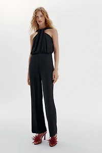TWISTED NECK FLARE JUMPSUIT