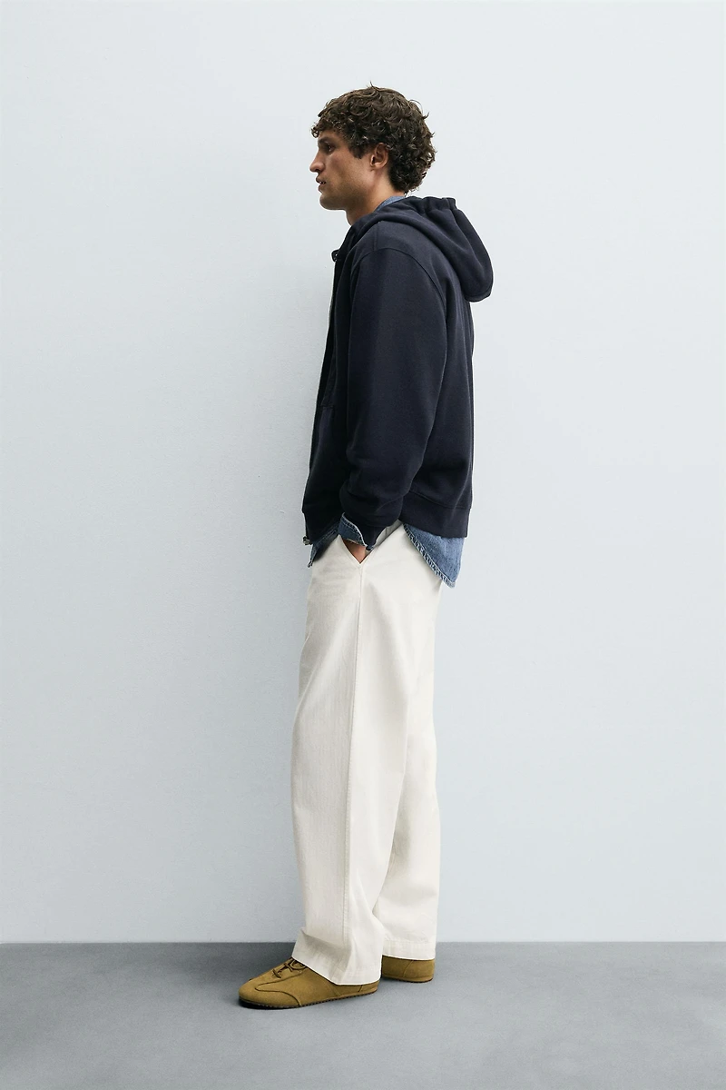 SWEAT ZIPPÉ À CAPUCHE