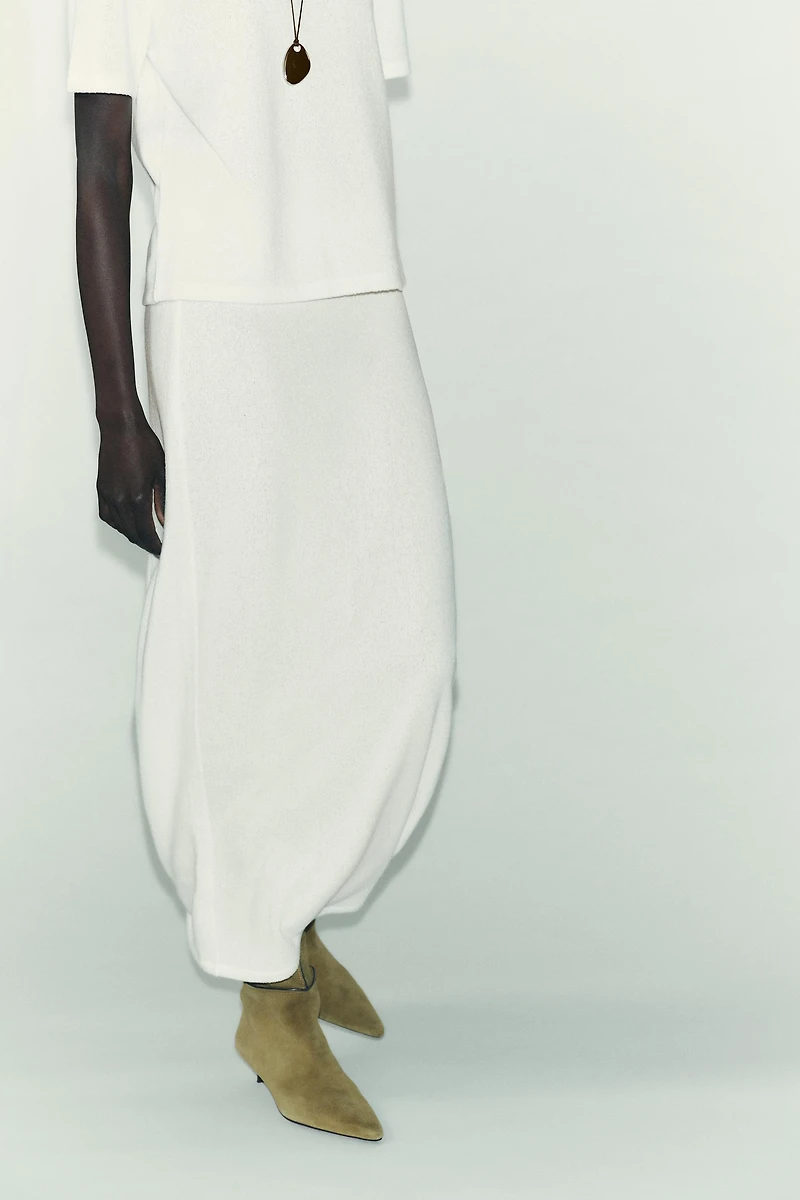 CUT-OUT KNIT MIDI SKIRT