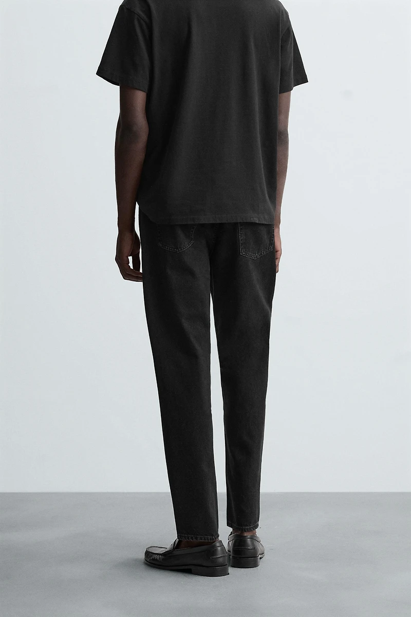 SLIM TAPERED FIT JEANS