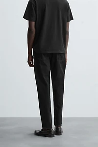 SLIM TAPERED FIT JEANS