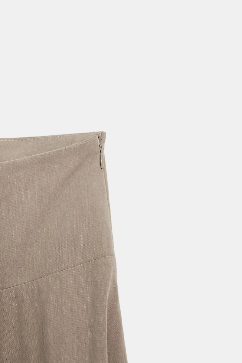ASYMMETRIC HEM MIDI SKIRT