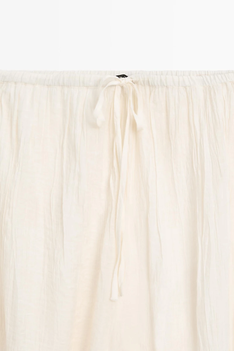 Flowing sarouel trousers with embroidered detail