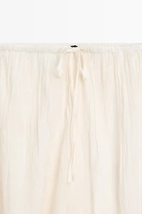 Flowing sarouel trousers with embroidered detail