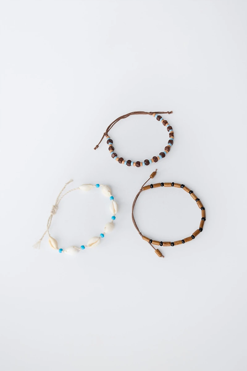 THREE-PACK OF BEADED SHELL BRACELETS