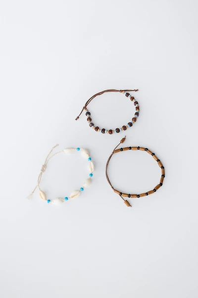 THREE-PACK OF BEADED SHELL BRACELETS