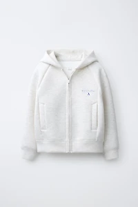 SWEAT ZIPPÉ SPORT EN NÉOPRÈNE