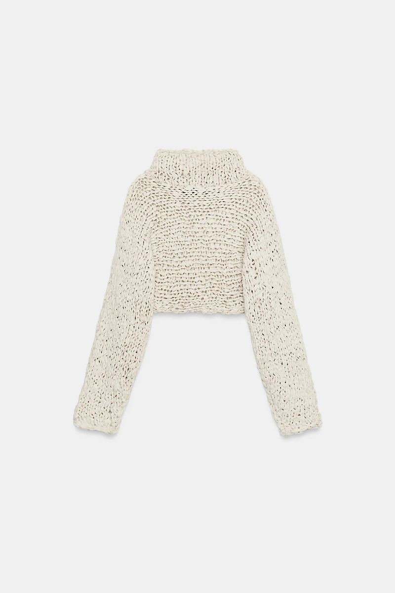 CROPPED KNIT JUMPER WITH INTERTWINED TAPE