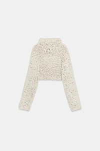 CROPPED KNIT JUMPER WITH INTERTWINED TAPE