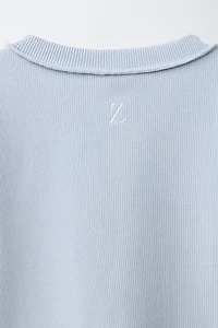 T-SHIRT SURJETÉ À BOUTONS