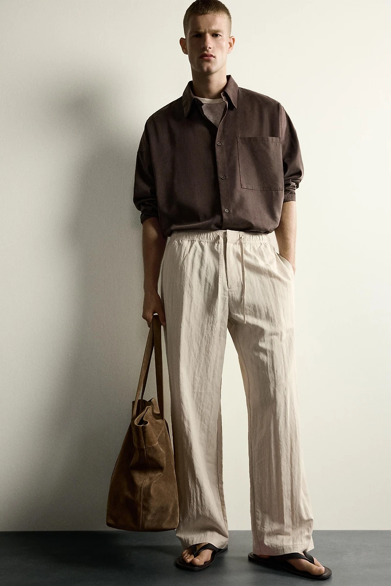 CRINKLED EFFECT TECHNICAL RELAXED FIT PANTS