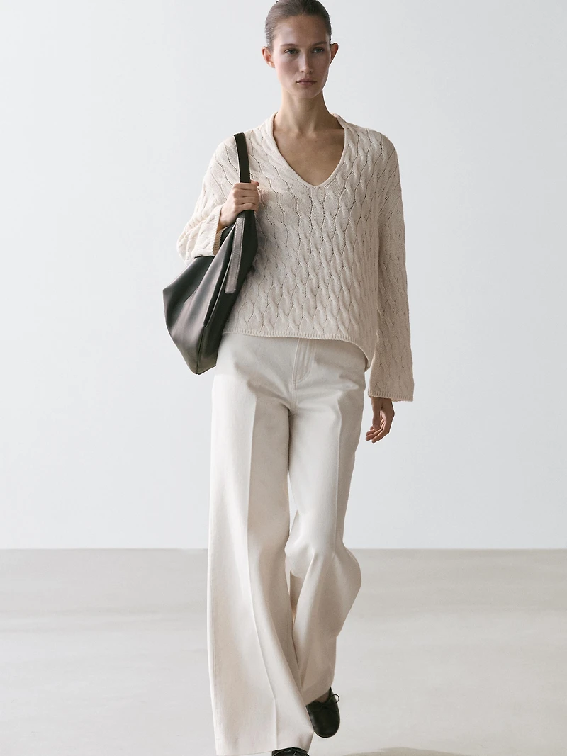 Cotton blend knit sweater with knot details