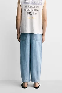 PANTALON DENIM CHINO COUPE AMPLE À PLIS