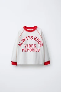 TEXT RAGLAN SLEEVE T-SHIRT