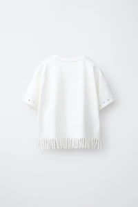 T-SHIRT À FRANGES ET CLOUS