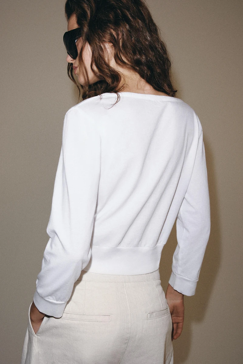 V-NECK BUTTON-UP TOP