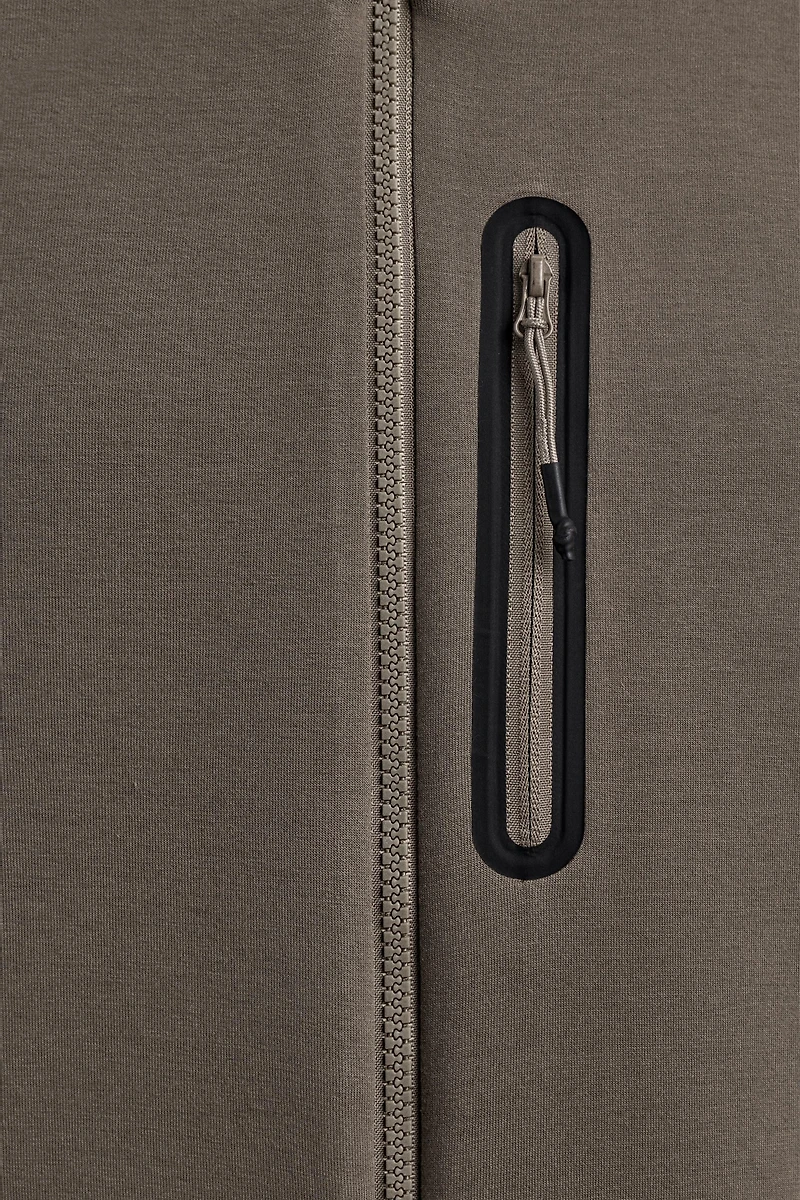 SWEAT TECHNIQUE ZIPPÉ À CAPUCHE