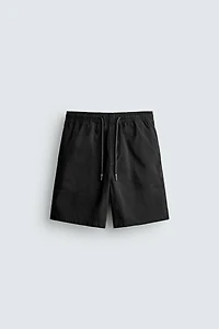 WASHED RELAXED FIT SHORTS