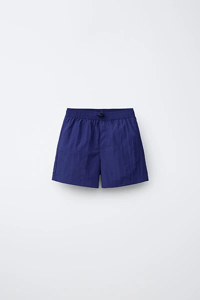 AGES 6-14 / SWIM SHORTS WITH STOPPER