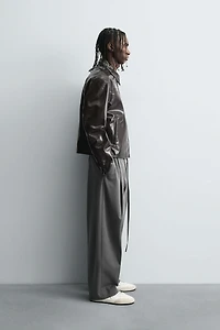 BALLOON PLEATED BELTED PANTS