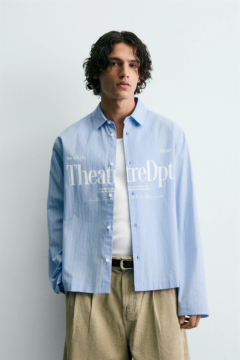 CHEMISE RELAXED FIT À CARREAUX ET INSCRIPTION