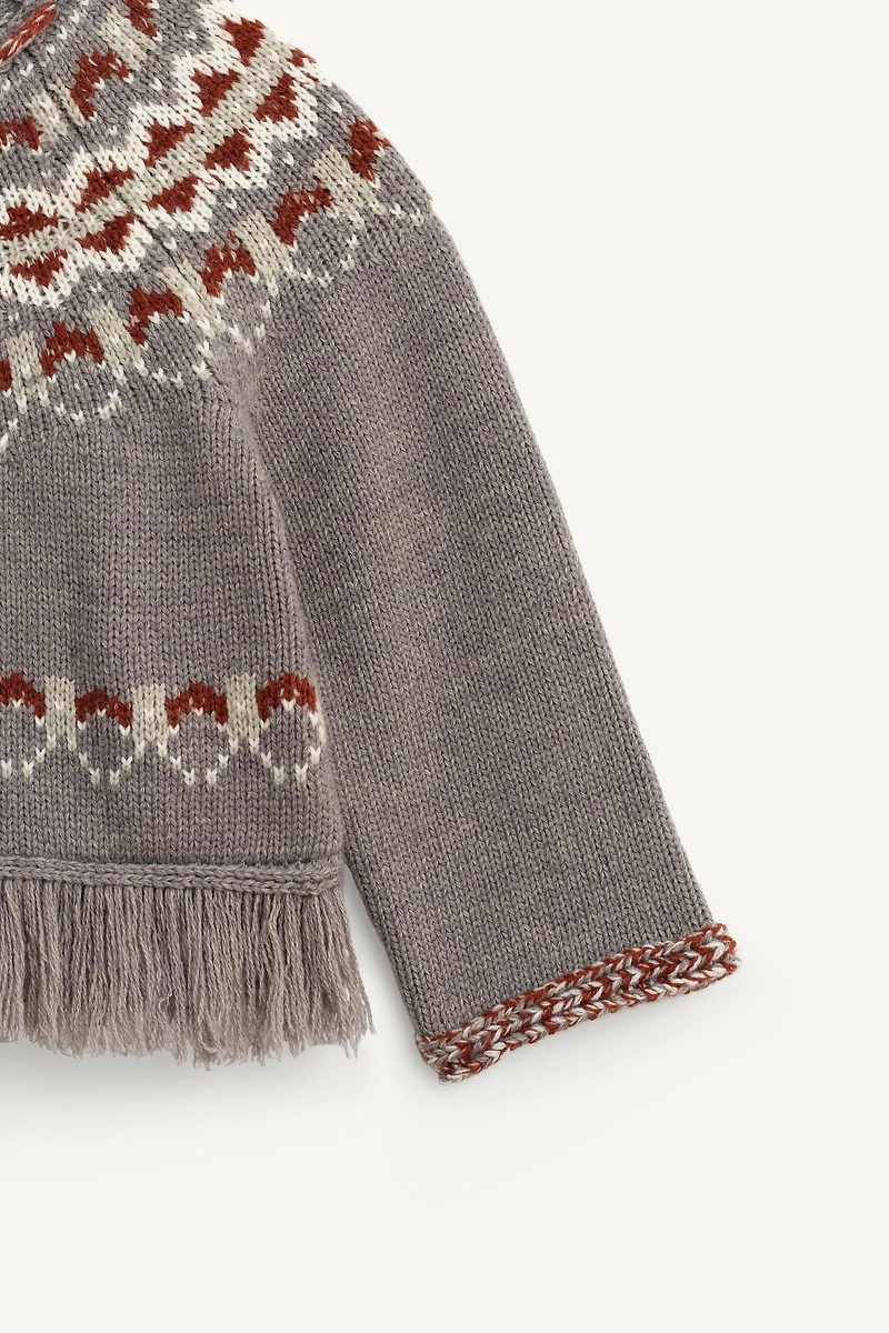 LIMITED EDITION WOOL FRINGED PONCHO JUMPER