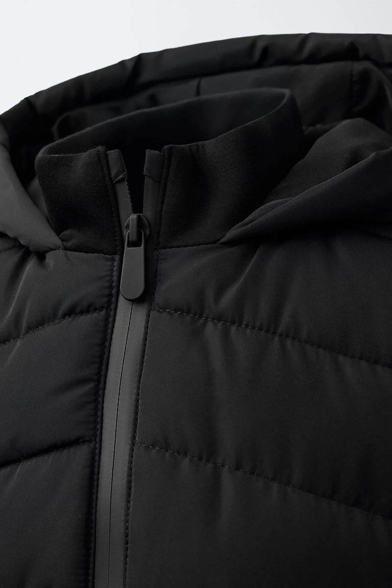 VESTE MATELASSÉE MANCHES EFFET NÉOPRÈNE