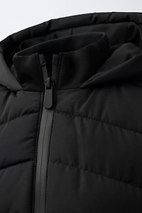 VESTE MATELASSÉE MANCHES EFFET NÉOPRÈNE