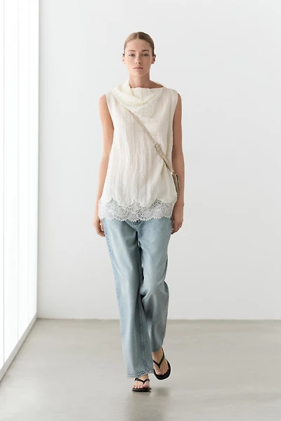 Asymmetric roll neck top with lace detail