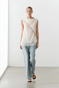 Asymmetric roll neck top with lace detail