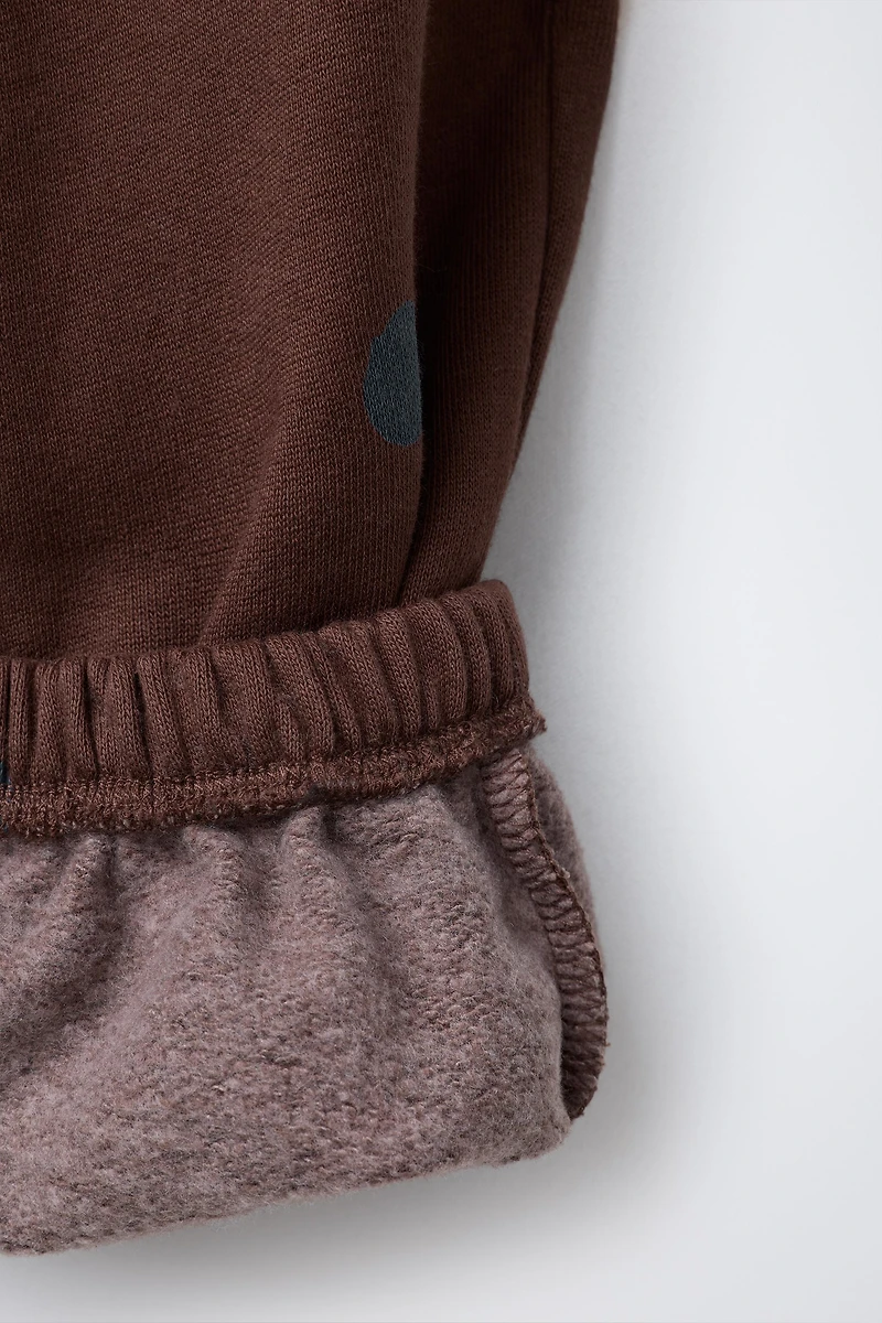 PANTALON DE JOGGING À POIS