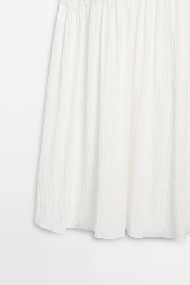 Matching dress with pleated skirt