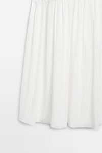 Matching dress with pleated skirt