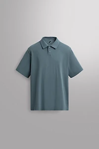 TECHNICAL PIQUÉ TRAINING POLO