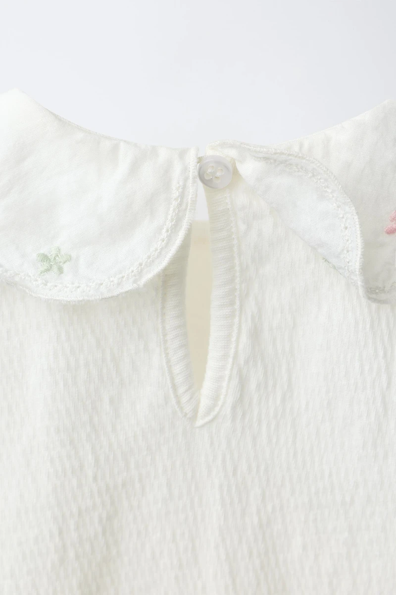 EMBROIDERED FLORAL COLLAR TEXTURED BODYSUIT