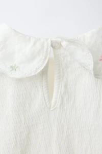 EMBROIDERED FLORAL COLLAR TEXTURED BODYSUIT