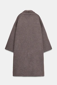 MANTEAU LONG EN MAILLE