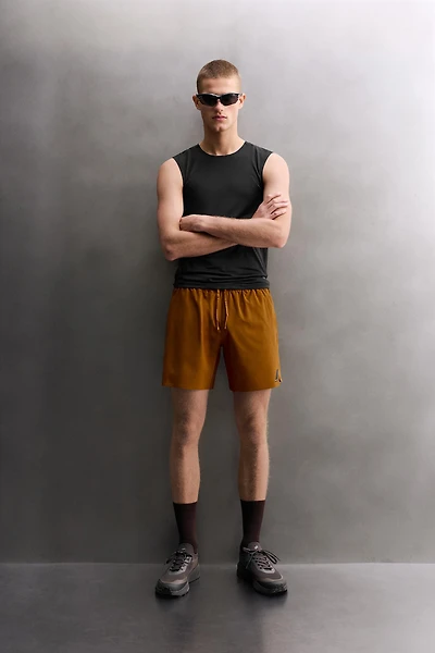 FIRST LAYER TANK TOP