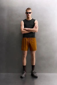 FIRST LAYER TANK TOP