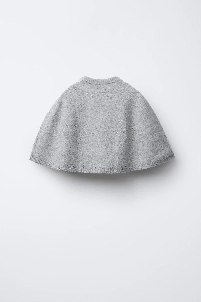 CAPE PONCHO WITH BOWS