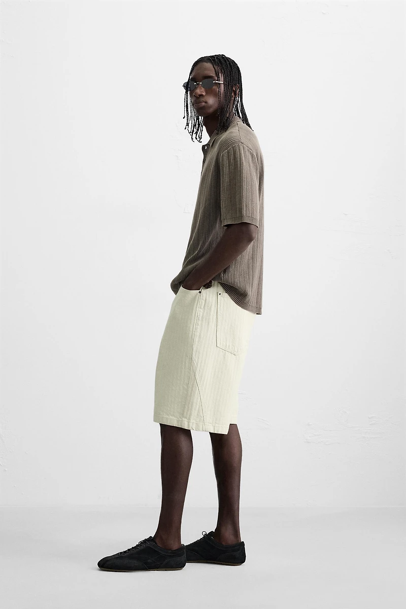 POLO EN MAILLE STRUCTURÉE DÉLAVÉE