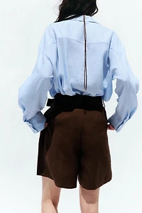 PLEATED BELT SHORTS