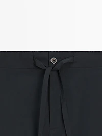 Total look technical trousers